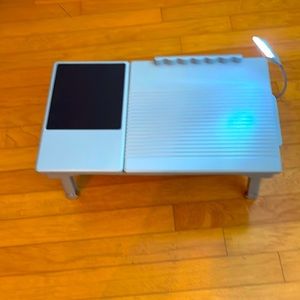 Computer laptop holder when sitting or in bed light connection battery operated
